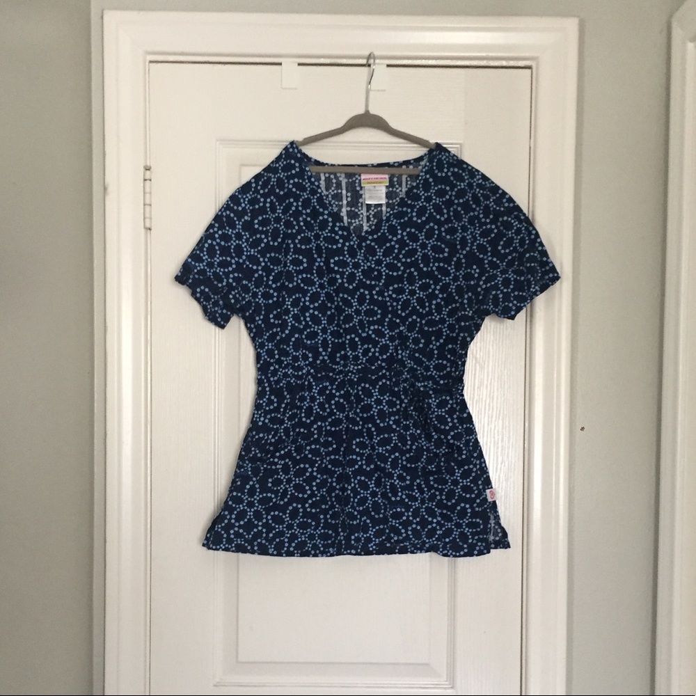 Navy blue sketchers scrub top with circle pattern